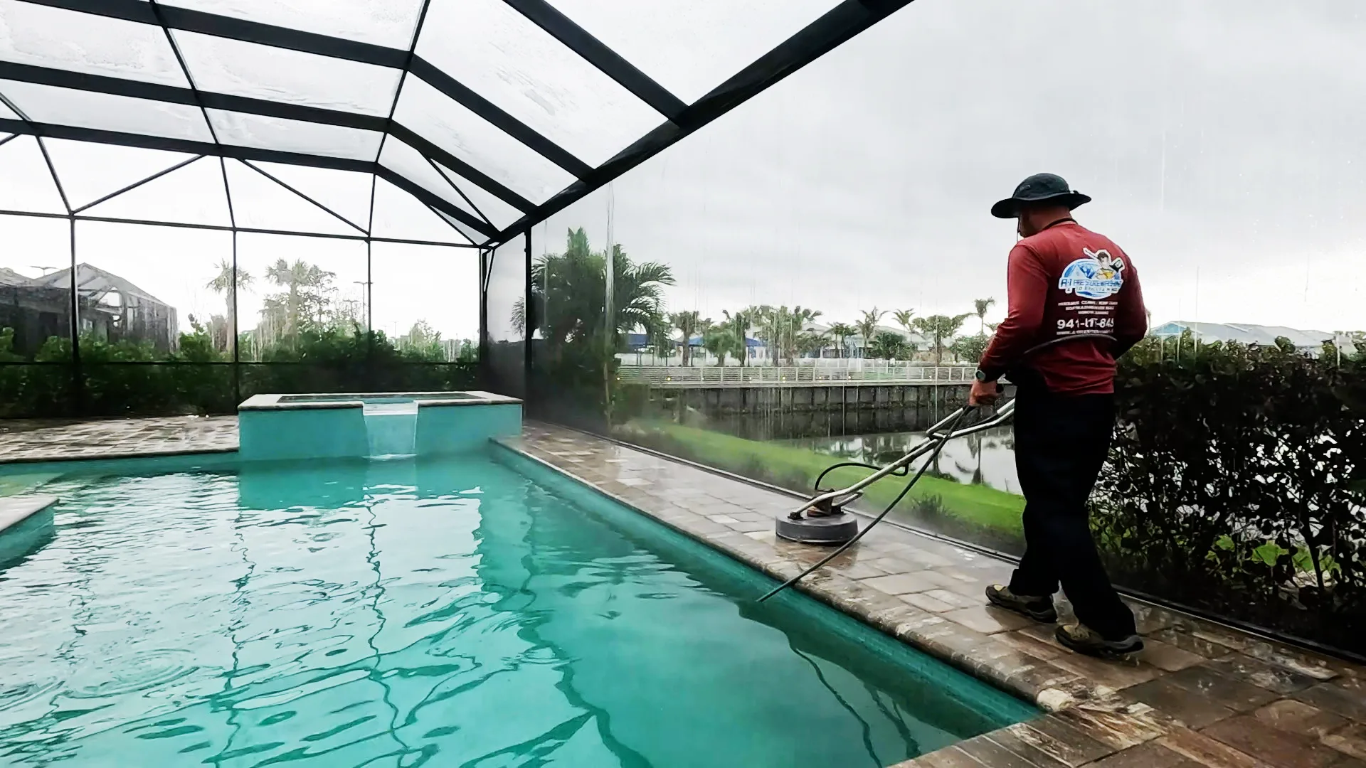 pressure cleaning pool deck in Beachwalk by manasota key